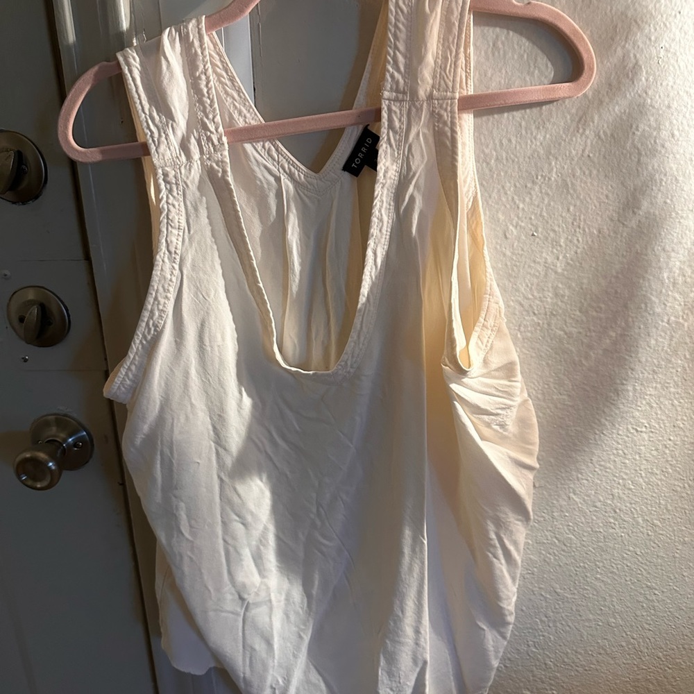 Sleeveless soft cream blouse
